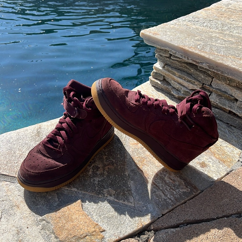Barely worn. Slight crease. Youth size 4Y. Nike Air Force Burgundy